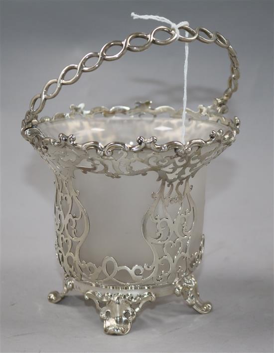 A Victorian pierced silver sugar basket by Creswick & Co, London, 1852?, with frosted glass liner, height 12cm.
